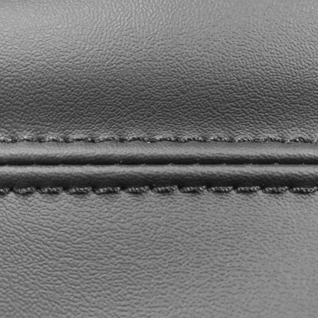 Close-up of seam on console lid cover