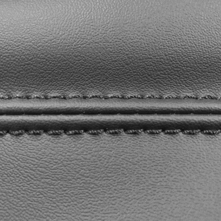 Close-up of seam on console lid cover