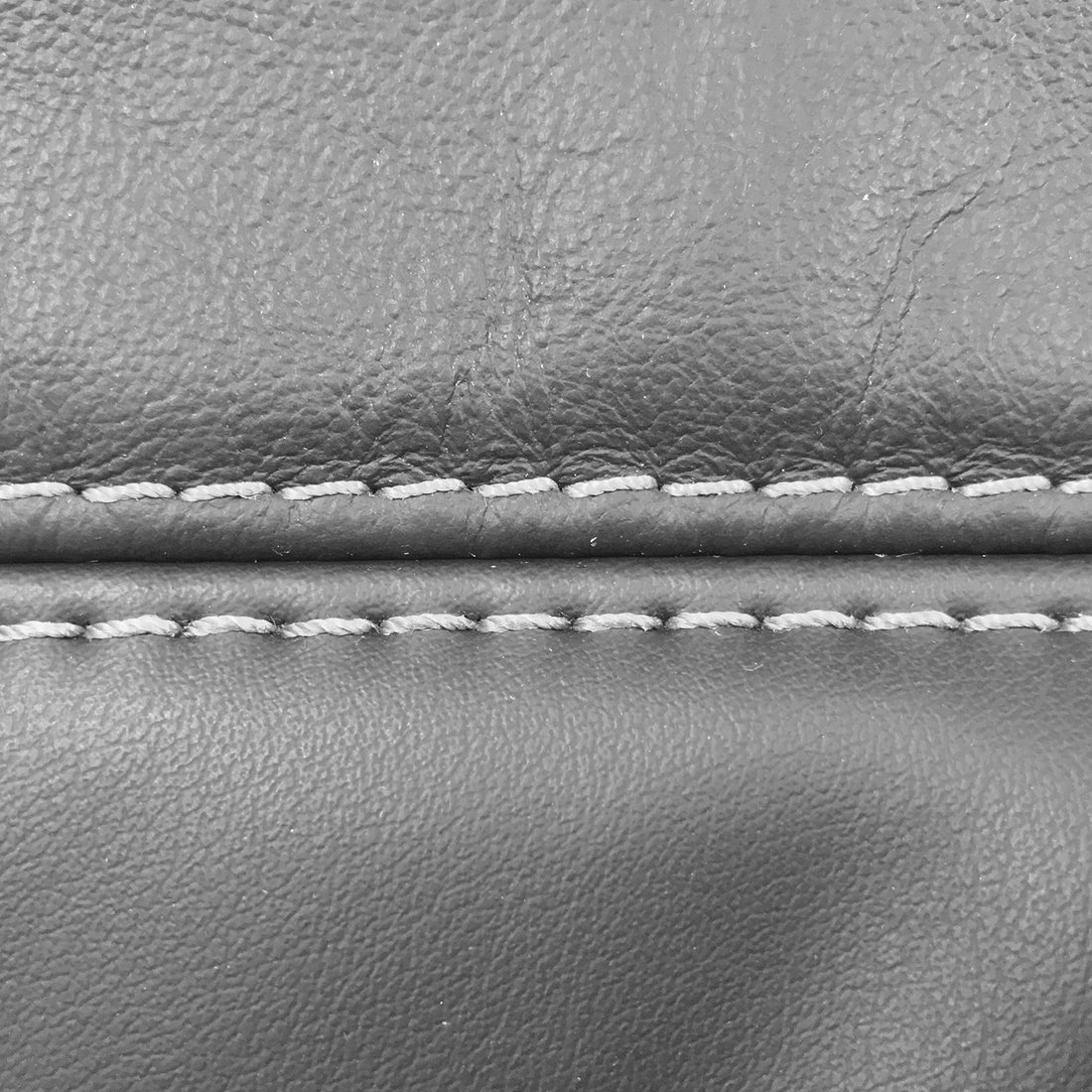 Close-up of seam on console lid cover